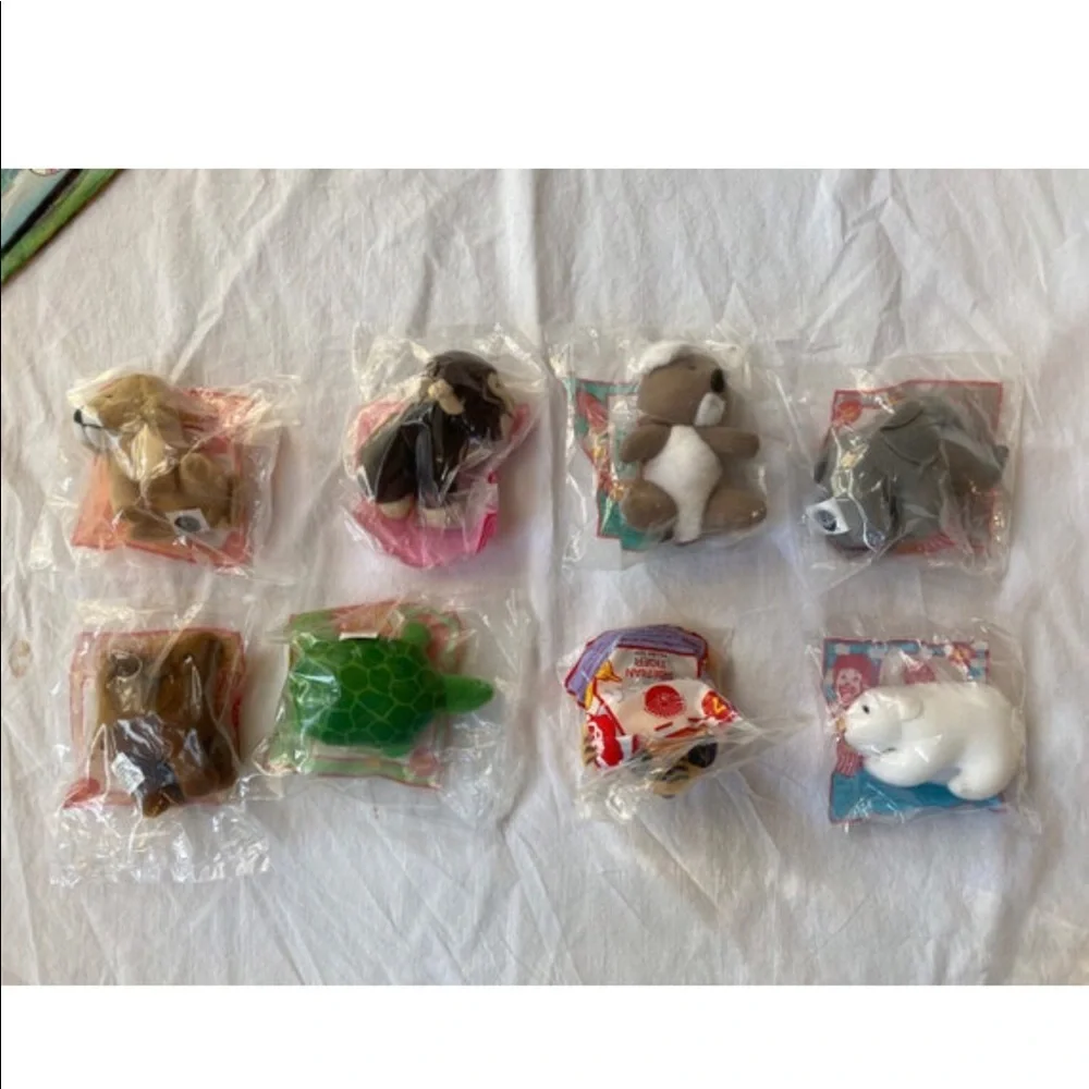 Vintage series of Amazing Wildlife McDonalds Happy Meal Toys and one box- NEW